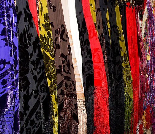 Photoshop filter effects on colorful skirts in a clothing store.