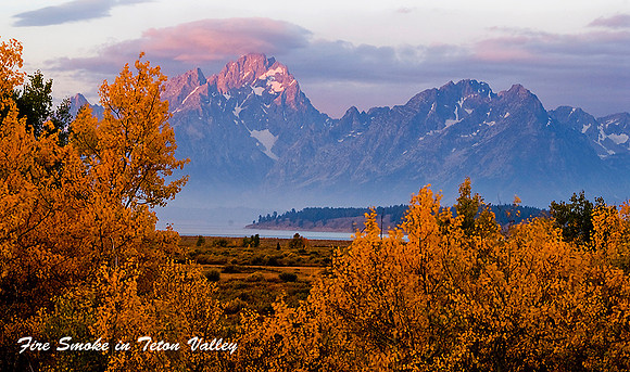 The Grand Teton Range With Fire Smoke