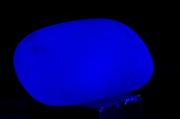 The rock is chalk but I used a blue gel in front of the light.