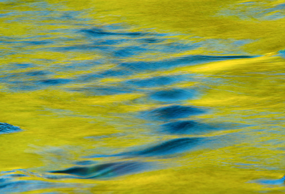 Reflections at LeHardy Rapids of the Yellowsstone River.