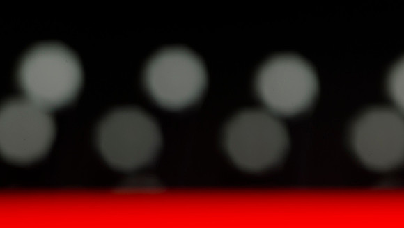 Side view of hair brush out of focus.