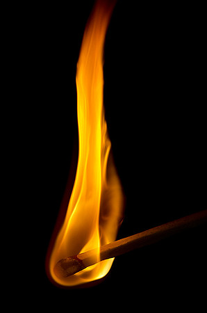 Lighted match & Black velvet.