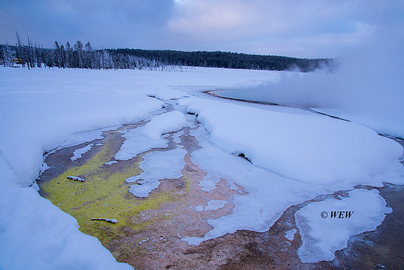 Cold temperatures in January soon cool hot waters and are covered by snow.